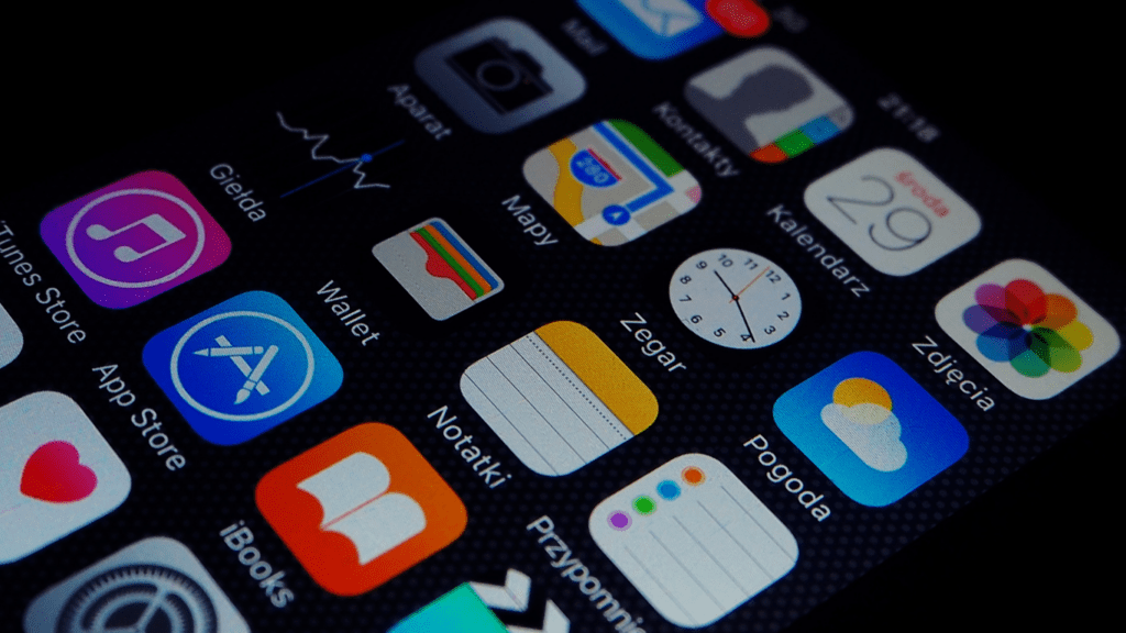 an iphone with many different apps displayed on the screen