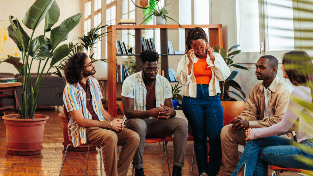 a group of people sitting on chair