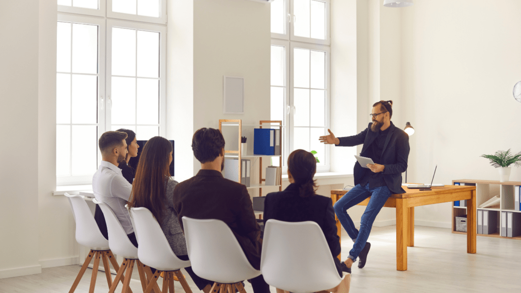 a person giving a presentation to a group of people